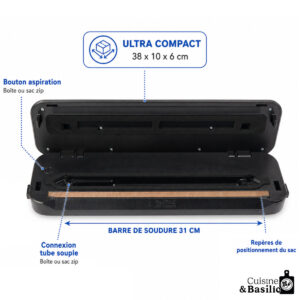 Ultra-compact vacuum sealer open, showing 31 cm sealing bar and bag guidance labels (Cuisine & Basilic).