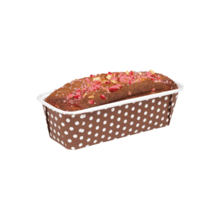 Chocolate loaf cake in a brown polka-dot baking cup topped with pink sprinkles and a white rim.