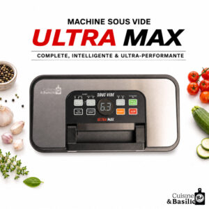 Ultra Max sous vide machine on a white surface, surrounded by garlic, veggies, and herbs with Cuisine & Basilic branding in the corner.