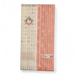 Packaging for a rotisserie product: beige left panel and pink right panel with repeating kitchen icons and a rooster logo.